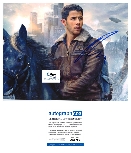 NICK JONAS AUTOGRAPH SIGNED 8x10 PHOTO JONAS BROS SINGER JUMANJI ACOA