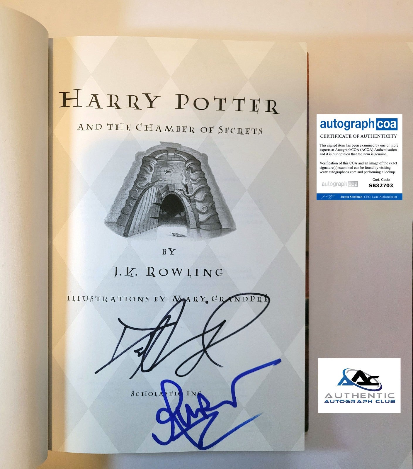 DANIEL RADCLIFFE AND RUPERT GRINT AUTOGRAPH SIGNED HARRY POTTER BOOK ACOA
